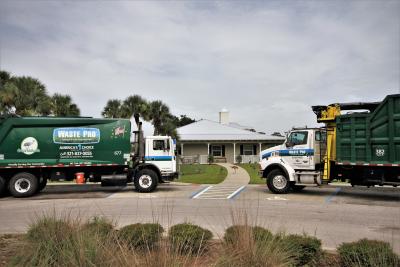 Waste Pro trucks in front of Grant-Valkaria Town Hall